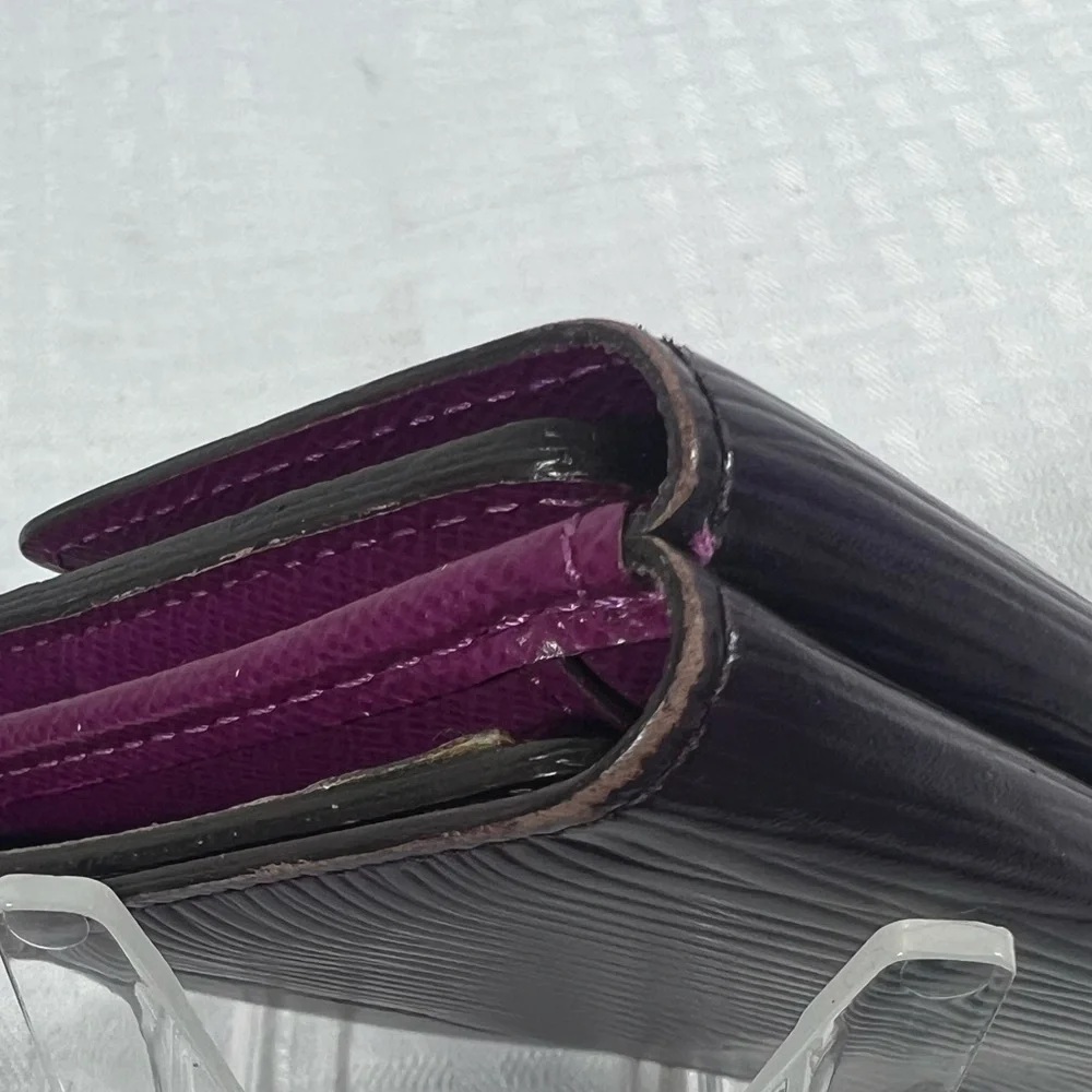 1136: Louis Vuitton Epi Leather Trifold Wallet Purple